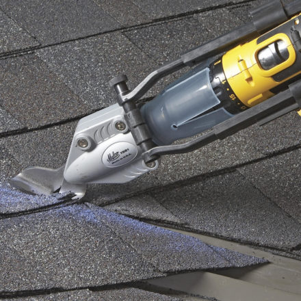 Malco's TSS1 tool being used to cut asphalt shingles on a roof