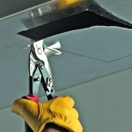 Malco Vertical Aviation Snips Cutting Through Metal Duct