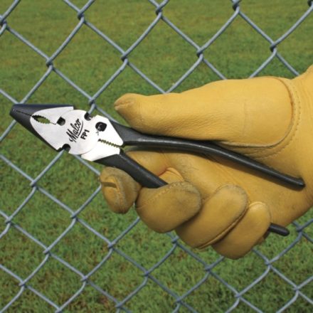 Fencing pliers being used on fence